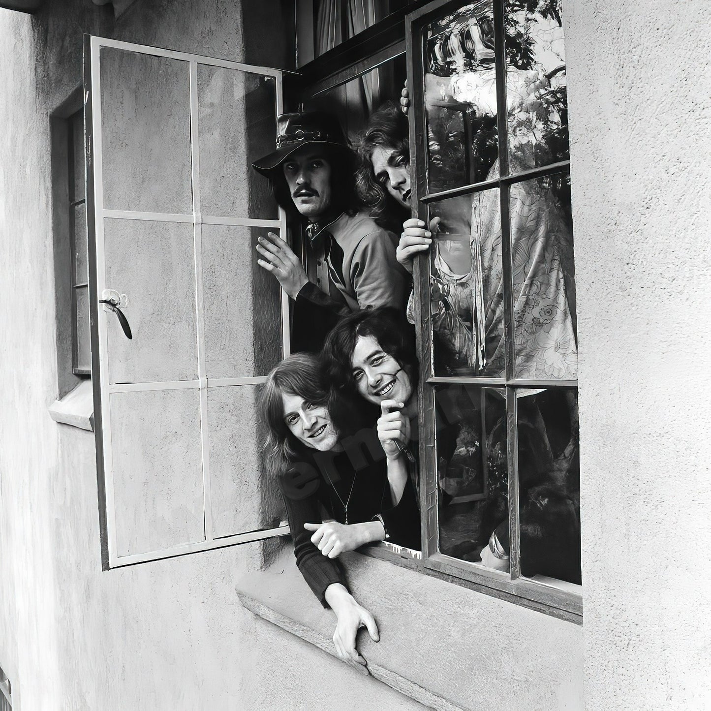 Led Zeppelin Smiling And Leaning Out Window At The Chateau Marmont B&W Photo - Celebrity Musicians