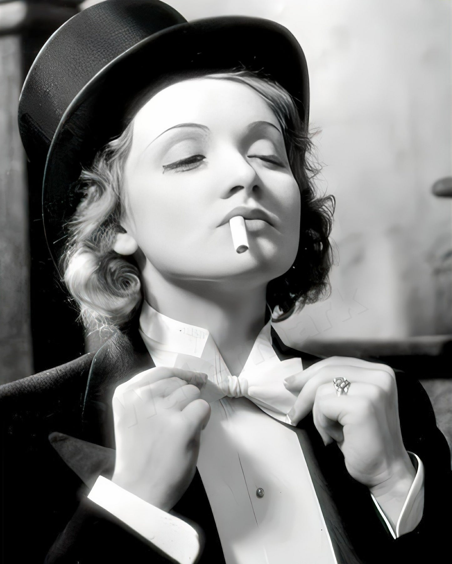Marlene Dietrich 1930's adjusting her bow tie B&W Photo - Celebrity Actresses